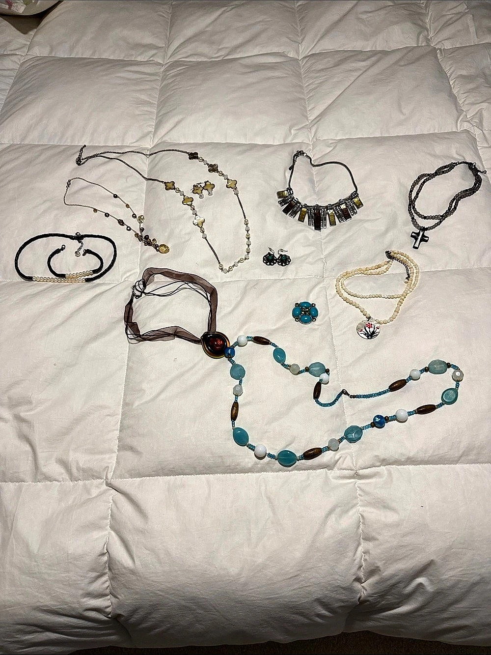 Assorted Jewelry Lot in Blue & Gold 8 Necklaces, 1 bracelet , two earnings, 1 br